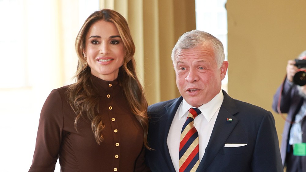 Queen Rania with husband King Abdullah II of Jordan, king charles coronation reception for overseas guests, brown schiaperelli dress fashion style