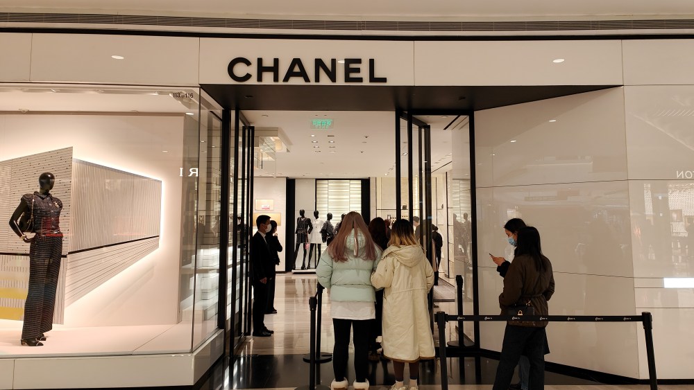 Shoppers line up at Chanel's Plaza 66 store in Shanghai, China.
