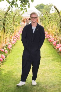 EGHAM, ENGLAND - JUNE 18: Tom Rhys Harries arrives with a wheely chauffeur to the Cartier Queen's Cup Polo 2023 on June 18, 2023 in Egham, England. (Photo by Dave Benett/Getty Images for Wheely)