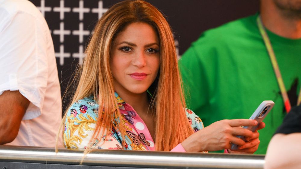 Shakira texting and watching the F1 Grand Prix of Spain on June 4 in Barcelona.