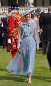 At the Buckingham Palace garden party, the Princess wore an Elie Saab pussy bow top and skirt set, first seen on her at Royal Ascot in 2019. The set was paired with a Philip Treacy hat, Elie Saab clutch, and Gianvito Rossi heels.