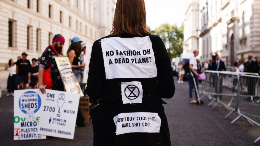Members of climate change activist group Extinction Rebellion protest against London Fashion Week.