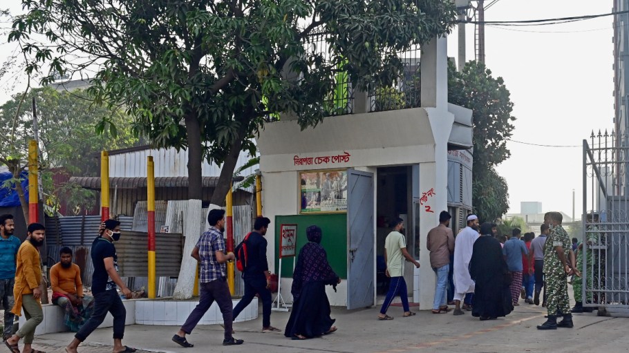 Workers enter a garment factory in Savar, on the outskirts of Dhaka in Bangladesh.