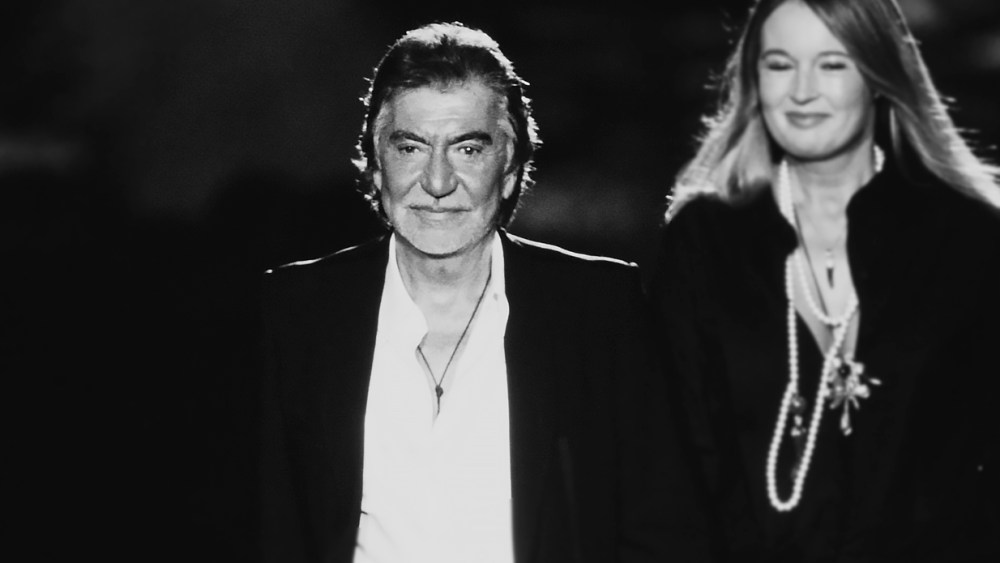 Designer Roberto Cavalli on the runway at show finale with wife Eva Düringer Cavalli.