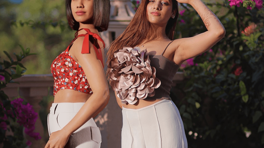 Myntra's computer-generated virtual fashion influencer, Maya, seen on the left next to a real person.