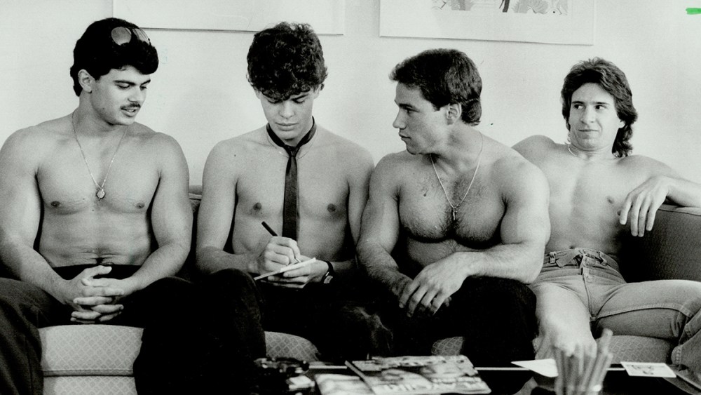 CANADA - OCTOBER 03: Meaty assignment: Star reporter Bill Walker (wearing tie) does a bare-chested interview with Playgirl hopefuls; from left; Peter Vitelli; 22; Vince Carpino; 21; and Steve Share; 27. Walker tried to muscle in on the photo session but confesses he's no beefcake. He joined about 500 other men who stripped to the waist for a photo session - but only a dozen will be chosen. (Photo by Reg Innell/Toronto Star via Getty Images), playgirl magazine models