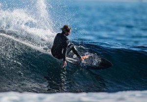 German American pro surfer Frankie Harrer wears a wetsuit from the Haydenshapes Rubber by Dion Lee capsule collection, which launches August 1st.