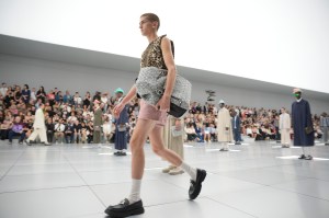 Model on the runway at Dior Homme Spring 2024 Menswear Collection Runway Show at the Military School on June 23, 2023 in Paris, France.