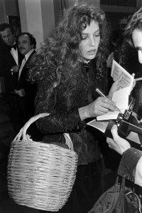 Jane Birkin signs autographs during an event at the Salle Pleyel in Paris, France in 1978.