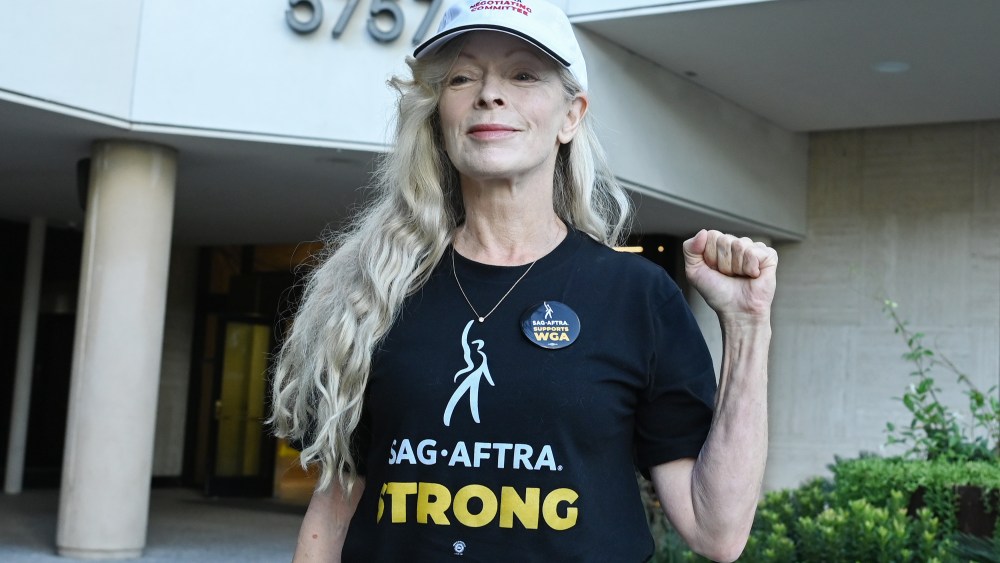 Frances Fisher walks the picket line in support of the SAG-AFTRA and WGA strike at the SAG-AFTRA Building on July 14, 2023 in Los Angeles, California.