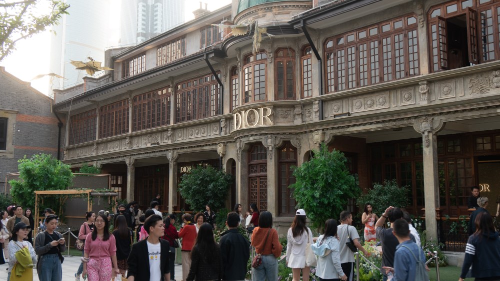 Shoppers line up to enter a Dior store at Zhangyuan, a newly established retail complex in Shanghai.