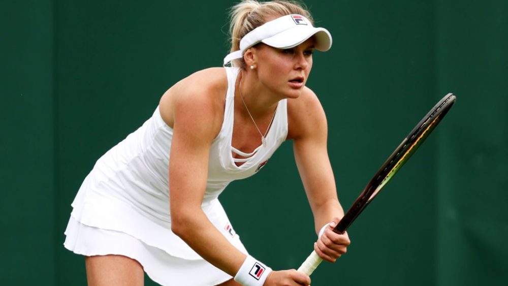 Kateryna Baindl plays against Leylah Fernandez on day one of Wimbledon 2023 on July 3 in London.