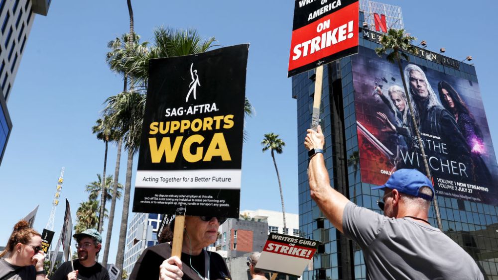 SAG-AFTRA members protesting in solidarity with striking WGA workers outside Netflix offices on July 11 in Los Angeles.