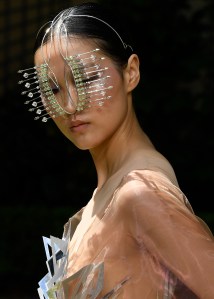 Model. on the runway at the Iris Van Herpen Fall 2023 Couture Collection Fashion Show on July 3, 2023 in Paris, France.