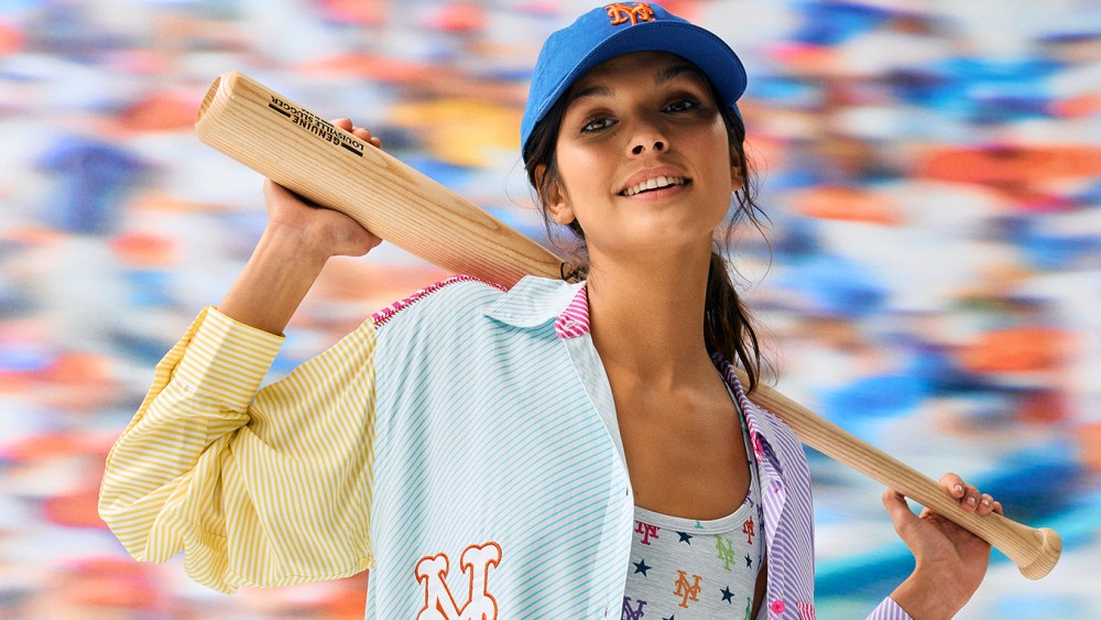 A New York Mets button-down, biker shorts and sports bra.