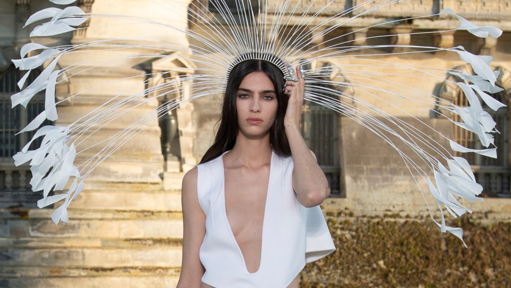 Model. on the runway at the Valentino Fall 2023 Couture Collection Fashion Show at Chateau de Chantilly on July 5, 2023 in Paris, France.