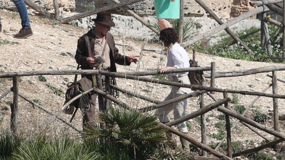 Harrison Ford and Phoebe Waller-Bridge are seen during Indiana Jones 5 Filming In Sicily, on October 19, 2021 in Temple of Segesta, Sicily, Italy. The bag over Ford's shoulder is believed to be a Frost River Geologist Pack, which is the subject of a lawsuit filed in a California court on Wednesday.