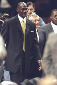 Michael Jordan of the Chicago Bulls with NBA Commissioner David Stern during a press conference to anounce Jordans retirement at the United Center in Chicago, Illinois in 1999.