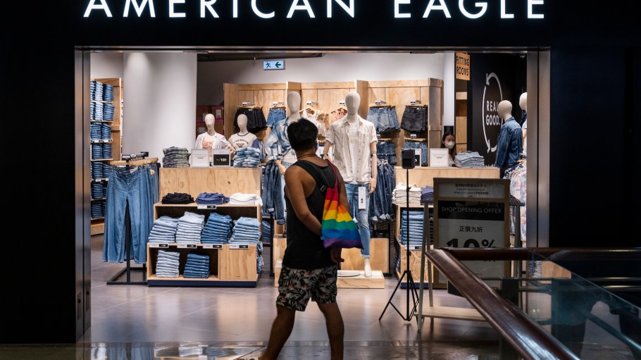 A shopper walks past the American clothing and accessories retailer American Eagle store in Hong Kong.
