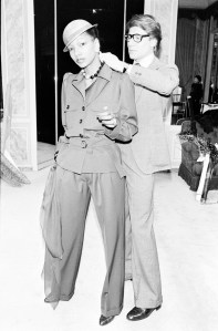 Designer Yves Saint Laurent and model Mounia Orosemane during a fitting for Yves Saint Laurent’s 1979 spring couture line in Paris on Jan. 29, 1979.