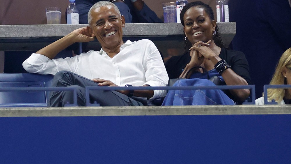 NEW YORK, NEW YORK - AUGUST 28: Former President of the United States Barack Obama and his wife Michelle Obama look on during ther Women's Singles First Round match between Coco Gauff of the United States and Laura Siegemund of Germany on Day One of the 2023 US Open at the USTA Billie Jean King National Tennis Center on August 28, 2023 in the Flushing neighborhood of the Queens borough of New York City. (Photo by Sarah Stier/Getty Images)
