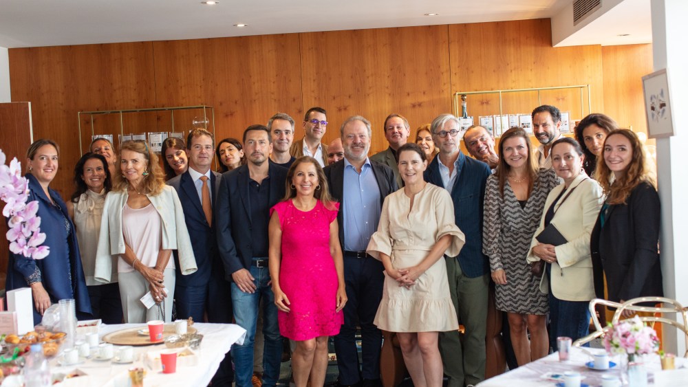 Karine Ohana and Odile Roujol (front and center) with guests at the "Brands With a Mission" event.