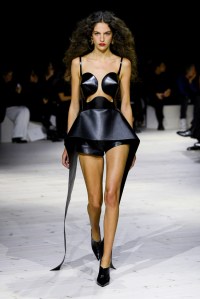 Model on the runway at Alexander McQueen Ready To Wear Spring 2024 held at Careau du Temple on September 30, 2023 in Paris, France.