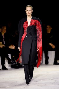 Model on the runway at Alexander McQueen Ready To Wear Spring 2024 held at Careau du Temple on September 30, 2023 in Paris, France.