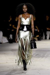 Model on the runway at Alexander McQueen Ready To Wear Spring 2024 held at Careau du Temple on September 30, 2023 in Paris, France.