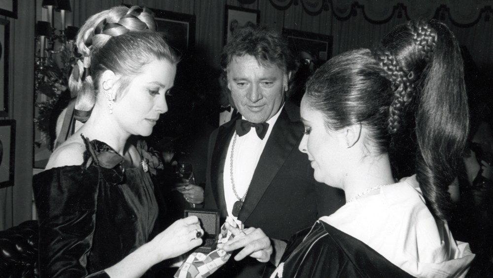 Grace Kelly, Richard Burton and Elizabeth Taylor at the "Bal des Scorpions, 1969