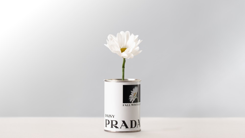 A Prada-branded can of daisy seeds.
