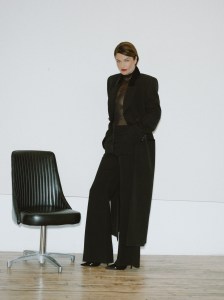 Givenchy polyester coat, silk sweater and wool pants; Givenchy shoes.