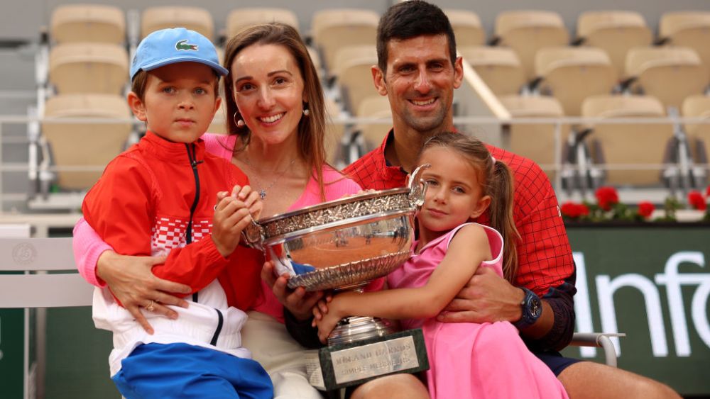 PARIS, FRANCE - JUNE 11: Novak Djokovic of Serbia, partner, Jelena Djokovic and their children pose for a photograph with the winners trophy after the Men's Singles Final match on Day Fifteen of the 2023 French Open at Roland Garros on June 11, 2023 in Paris, France. (Photo by Clive Brunskill/Getty Images)