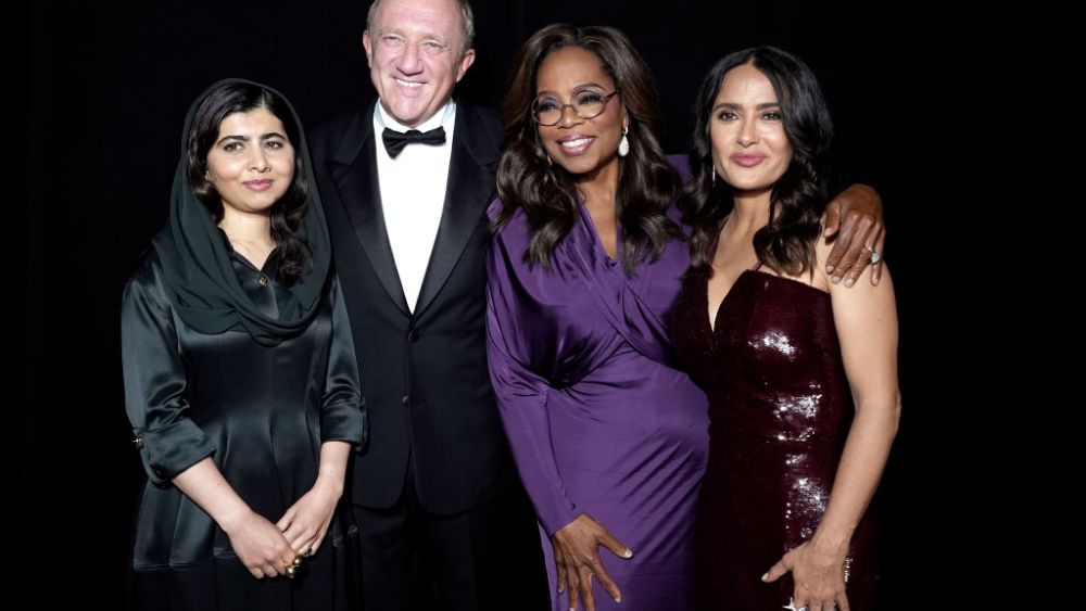 (L-R) Malala Yousafzai, François-Henri Pinault, Oprah Winfrey and Salma Hayek Pinault at the Kering Caring for Women Dinner on Sept. 12 in New York City.