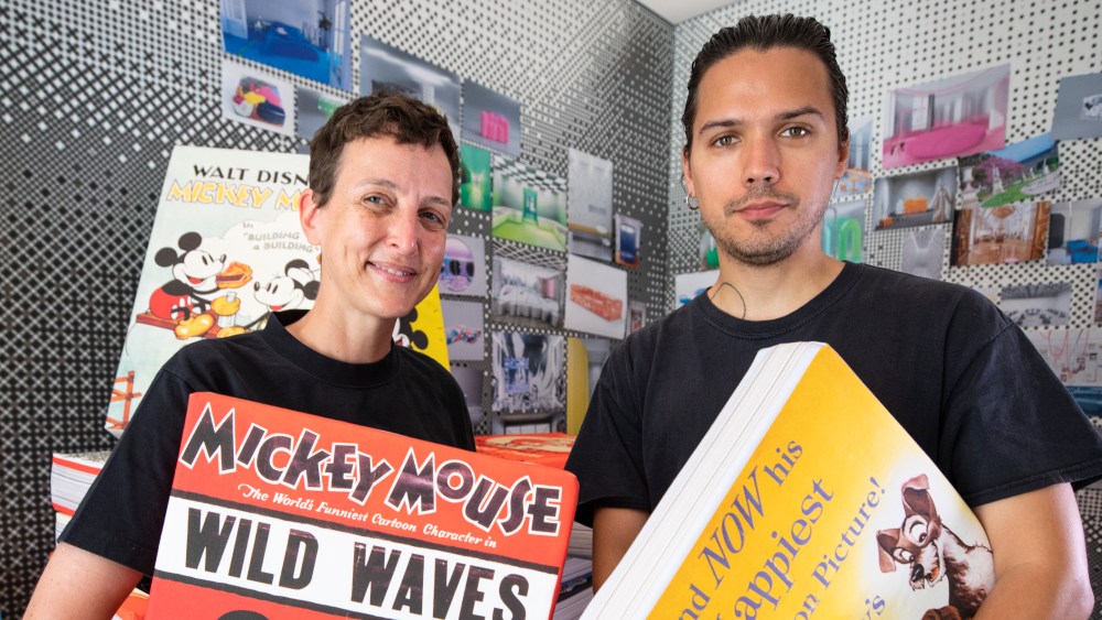 Sarah Andelman and Harry Nuriev with their giant pillow books for Disney's Create 100.