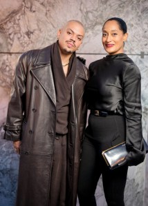 Evan Olav Næss and Tracee Ellis Ross at Saint Laurent Ready To Wear Spring 2024 held at Place Jacques Rueff on September 26, 2023 in Paris, France.