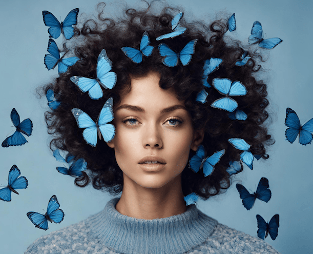 Blue butterflies swirl around the head of a glistening model with a curly hairstyle.