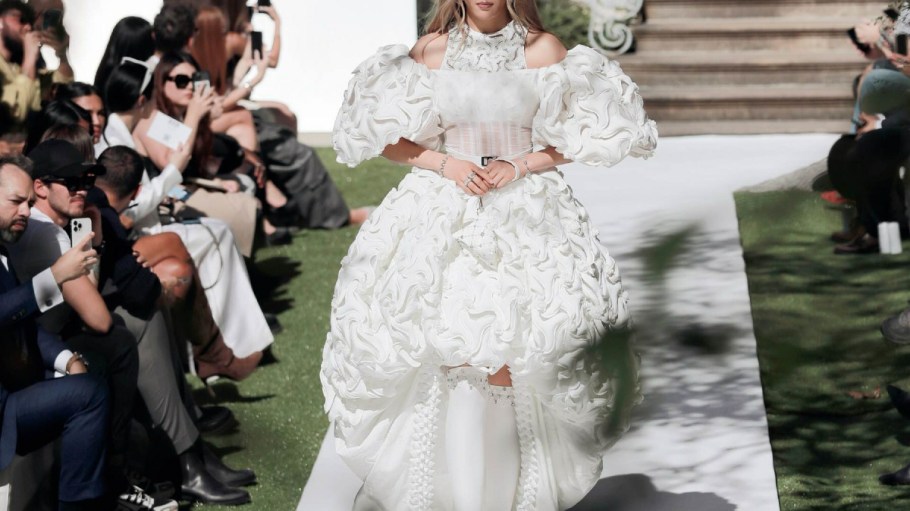 Global Brand Ambassador Eileen Gu walks the Bosideng SS24 Show.