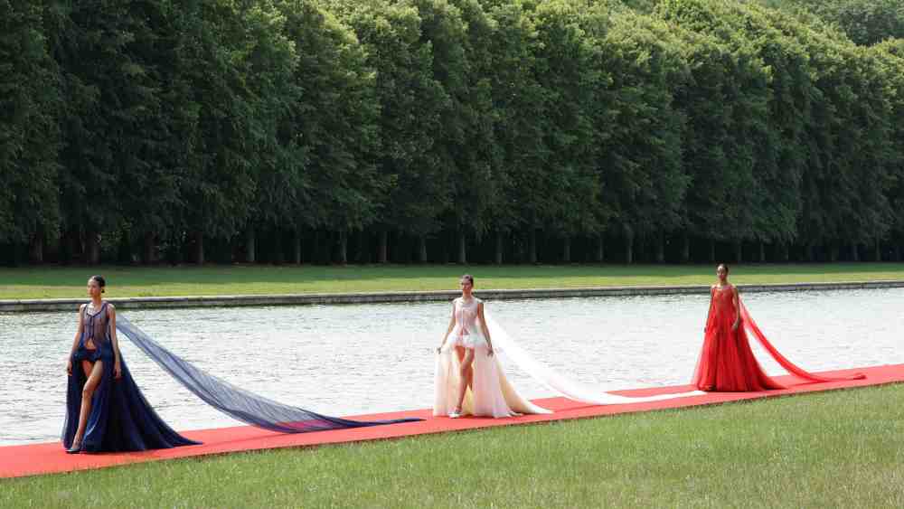 Models walk the runway during "Le Chouchou" Jacquemus' Fashion Show at Chateau de Versailles on June 26, 2023 in Versailles, France. (Photo by Pascal Le Segretain/Getty Images)
