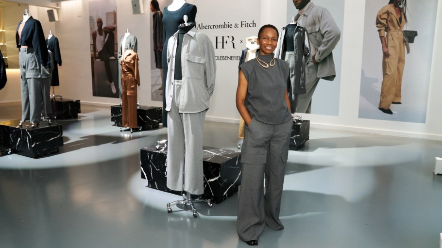 Nicole Benefield poses in front of pieces in her Abercrombie x HFR x Nicole Benefield collection at the October 3 event celebrating the collection.