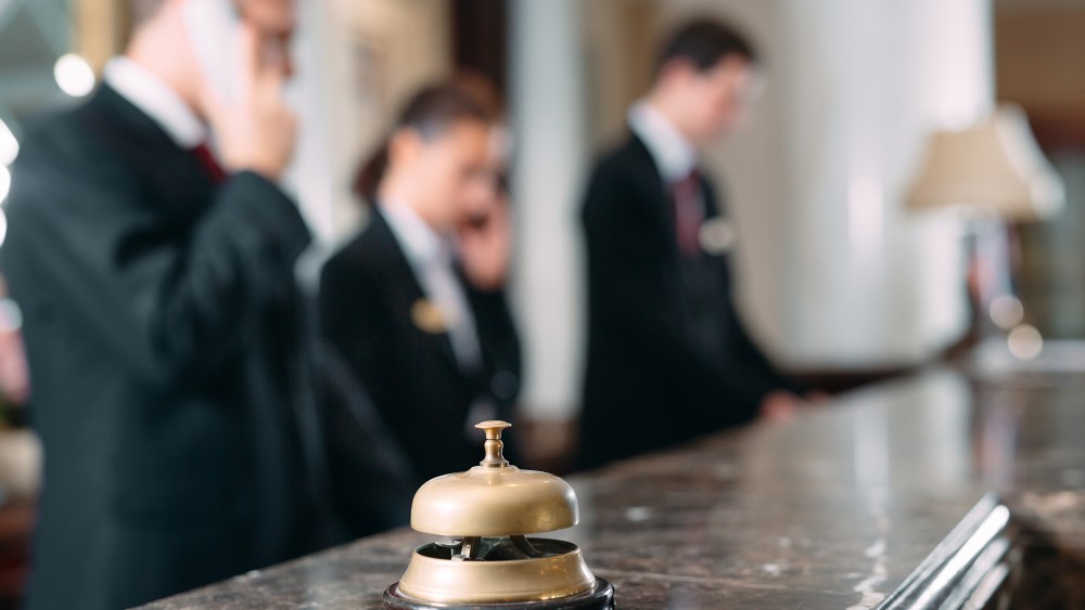 Hotel service bell Concept hotel, travel, room,Modern luxury hotel reception counter desk on background