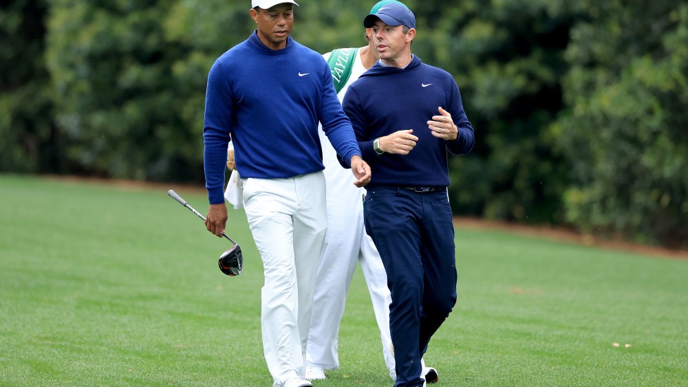 AUGUSTA, GEORGIA - APRIL 03: Rory McIlroy of Northern Ireland and Tiger Woods of The United States walk together on the 11th hole during a practice round prior to the 2023 Masters Tournament at Augusta National Golf Club on April 03, 2023 in Augusta, Georgia. (Photo by David Cannon/Getty Images)