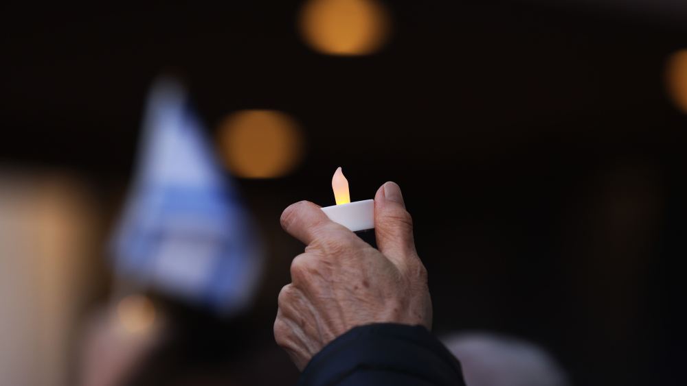 Attendees gather for a candlelight vigil in New York City.