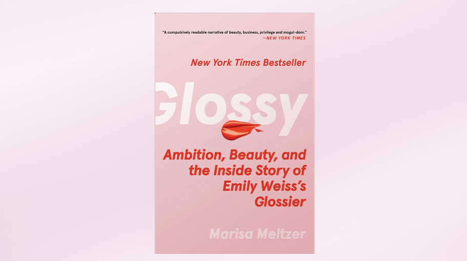 book on a pink and white background