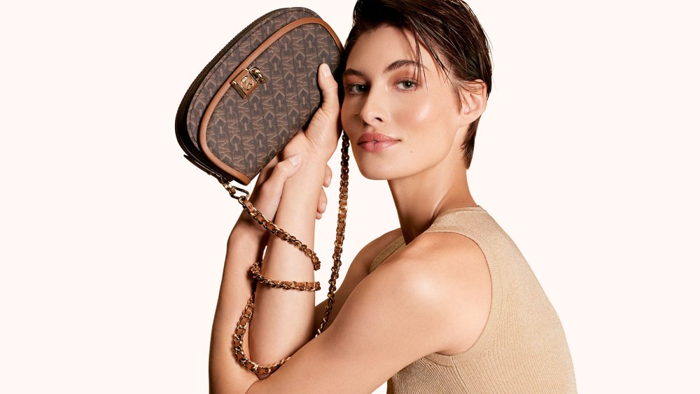 Michael Kors' new Empire Signature print featured in fall ad campaign.