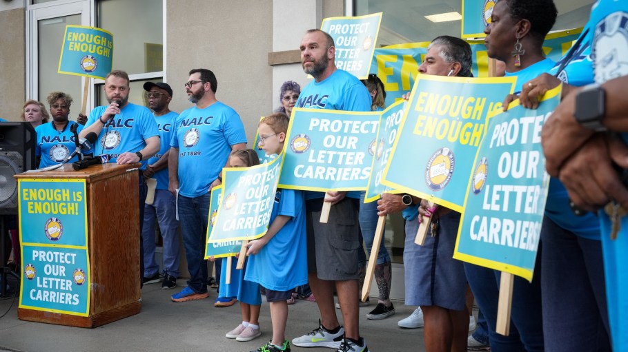 The National Association of Letter Carriers at a press conference Wednesday, Oct. 25, 2023, at a post office in Houston. Union members called for more prosecution of assaults of mail carriers and other safety measures.