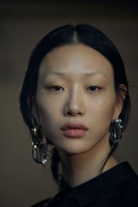 Backstage at Sacai RTW Spring 2024