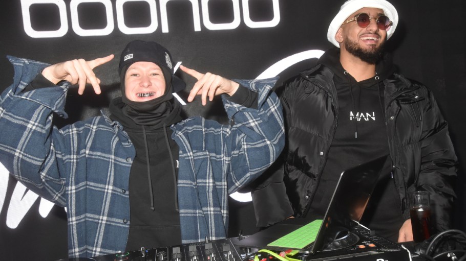 Dj Lucky aka DJ Lucky Kuzko and DJ Las M (white hat) perform during the Boohoo and Imen Es Show Case Party at Compagnie on Nov. 9, 2021 in Paris.