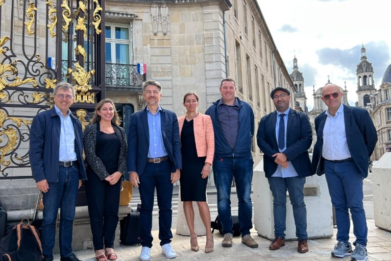 Emmanuel Ladent, Carbios CEO (third from left) and Mr Toudma, Mayor of Longlaville (second from right) with members of the Carbios team at the Nancy Prefecture (54).