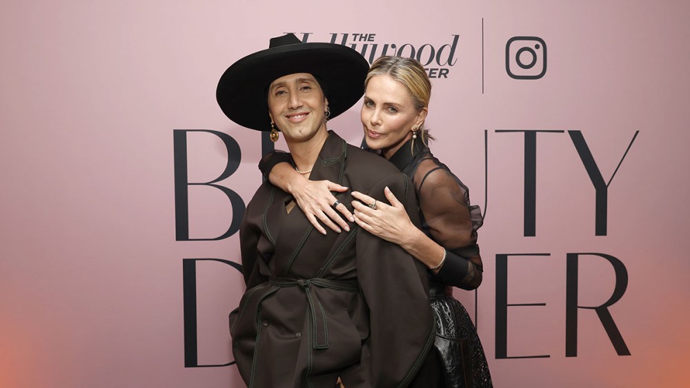 WEST HOLLYWOOD, CALIFORNIA - OCTOBER 25: (L-R) Adir Abergel and Charlize Theron attend The Hollywood Reporter Beauty Dinner Presented by Instagram, Sponsored by Upneeq, Honoring the Top Glam Squads in Hollywood at Holloway House on October 25, 2023 in West Hollywood, California. (Photo by Emma McIntyre/The Hollywood Reporter via Getty Images)